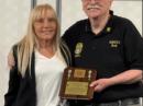 Elvira Simoncini, IV3FSG, accepts her Heritage CQ DX Hall of Fame plaque from INDEXA Vice President Bob Schenck, N2OO. [Rich Moseson, W2VU, photo]